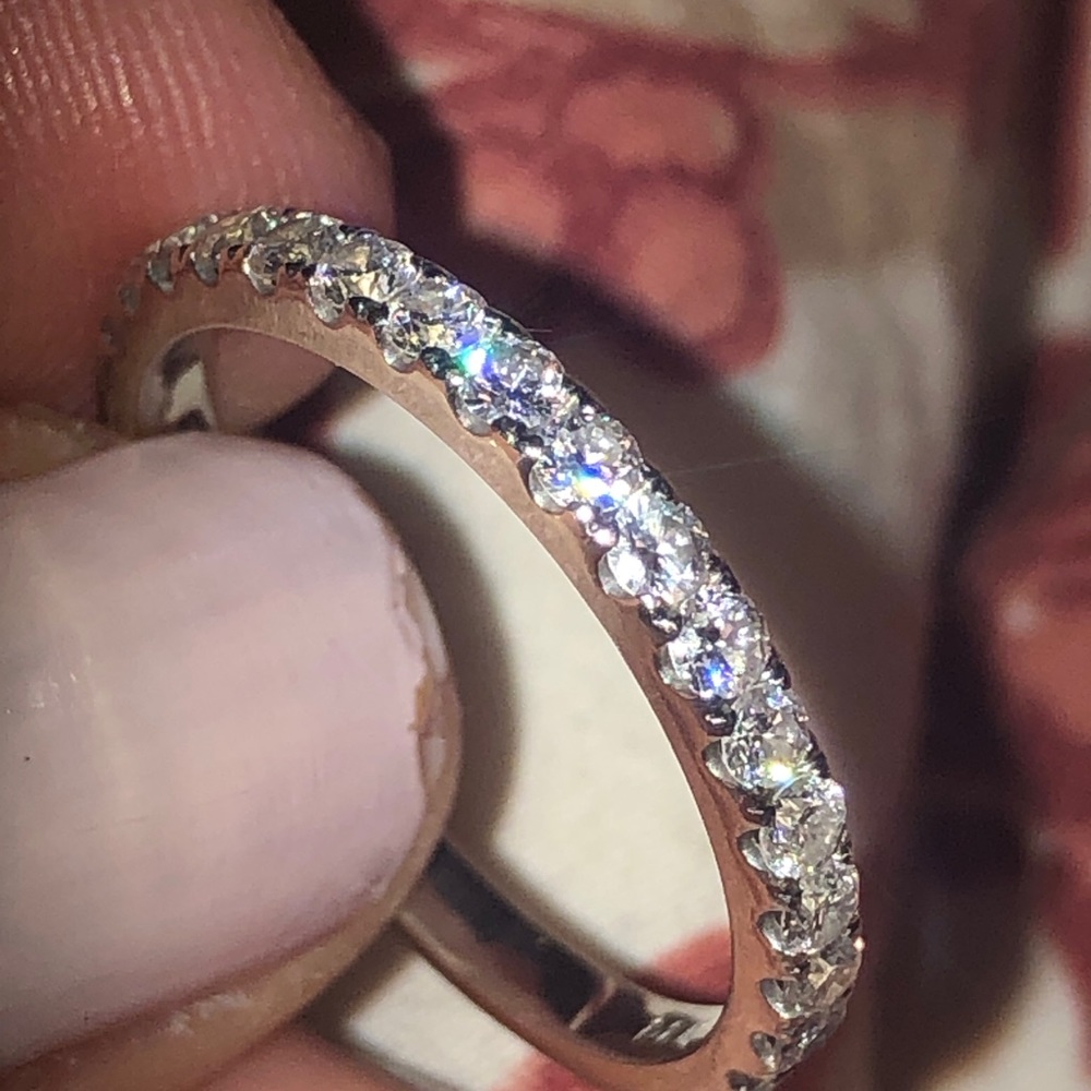 Super fiery 14k white gold natural diamond band size 8. Approx .75 cttw